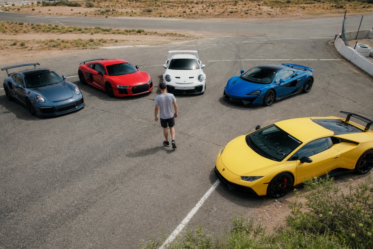 Choosing between five supercars in the Las Vegas track paddock