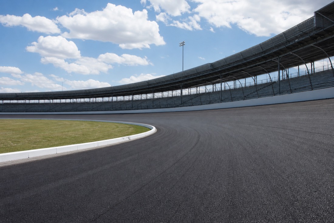 Empty grandstands at a large oval speedway near Las Vegas